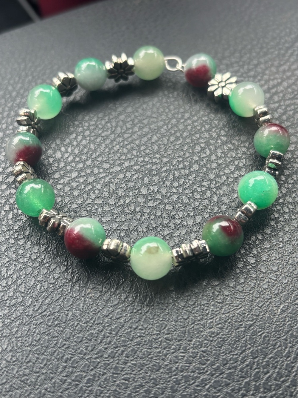 Handmade Green and Burgundy Beaded Bracelet with Silver Accents